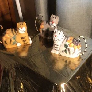 Three wooden cat figurines